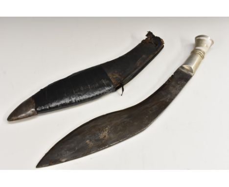 A Maharaja of Jodhpur`s State Forces kukri, blued blade, white metal handle, with blued blade, the correct black leather scab