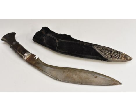 An early 20th century silver mounted kothimora kukri, 26.5cm blade, horn grip, silver bolster and butt cap, the silver mounte