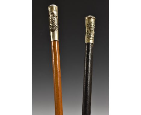 A World War I silver coloured metal mounted swagger stick, Gordon Highlanders, ebonised shaft, 62cm long; another, The Royal 