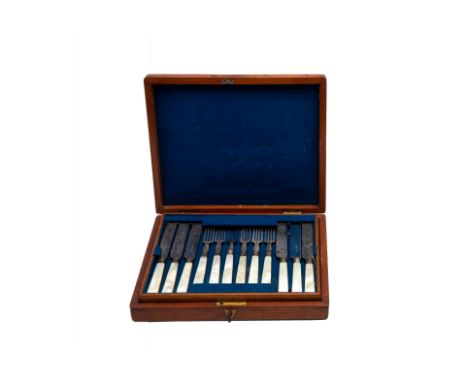 A SET OF MOTHER OF PEARL HANDLED FRUIT KNIVES AND FORKS
19th Century, twelve pairs, with silver plated tines and blades, in a