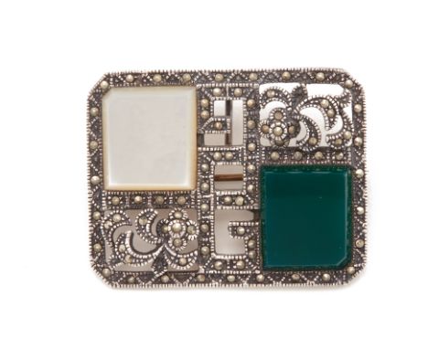 A MOTHER OF PEARL AND ONXY MARCASITE BROOCH
Set in silver, marked 925 to reverse
3cm x 4cm
Condition: For a condition report 