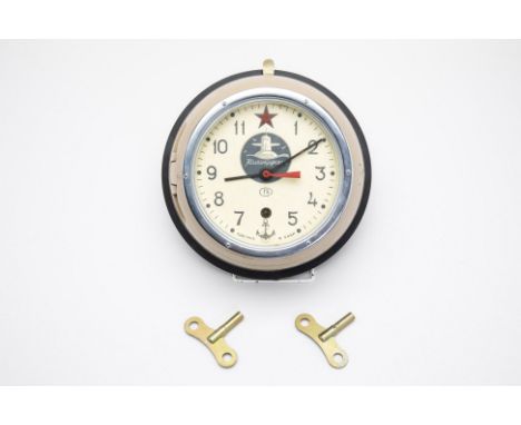 A VOSTOK RUSSIAN SOVIET SUBMARINE CLOCK
With Arabic numerals, a red star at 12 o'clock and anchor at 6 o'clock and with centr