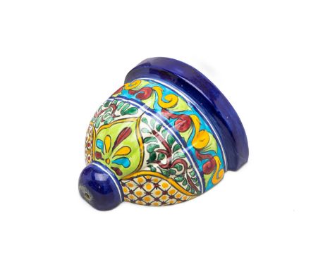 A MAJOLICA STYLE WALL PLANTER
Decorated with colourful scrolling foliate decoration
24cm high x 26cm wide
Condition: Cracking