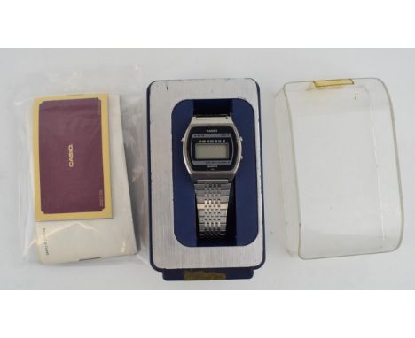 Vintage Casio 31QS-12 Digital LCD Men's Watch, original steel bracelet, box and papers. Case diameter 31mm.  In good working 