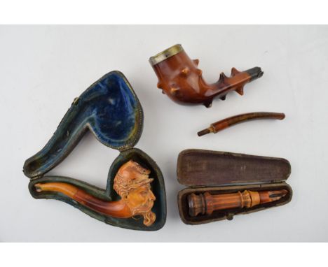 A collection of smoking related items to include a Briar pipe with hallmarked silver mount and amber mouth piece a/f, a Meers