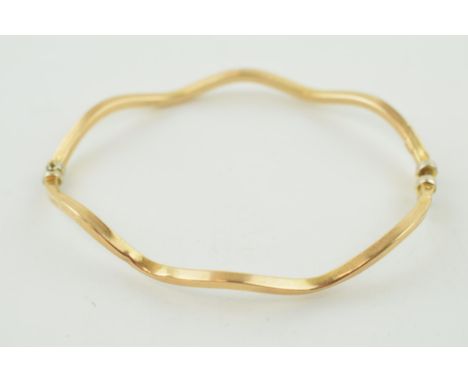 9ct gold shaped bangle, 4.1 grams,  Clasp is a little dented around the ends.