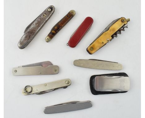 A mixed collection of vintage pocket knives to include a Swiss Army knife, pocket knives and other similar multi function poc