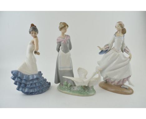 A trio of figures to include a Lladro girl 4820 with a Nao girl with geese and a girl in a frilly dress (3).  In good conditi