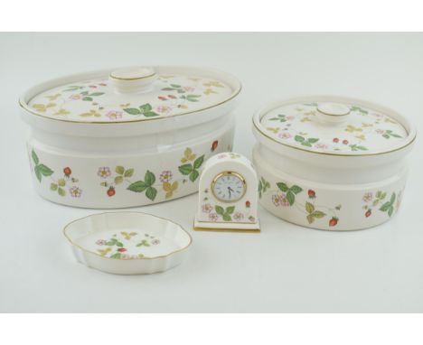 Wedgwoo Wild Strawberry to include a large oval tureen, a circular tureen, a mantle clock and a pin dish (4).  In good condit