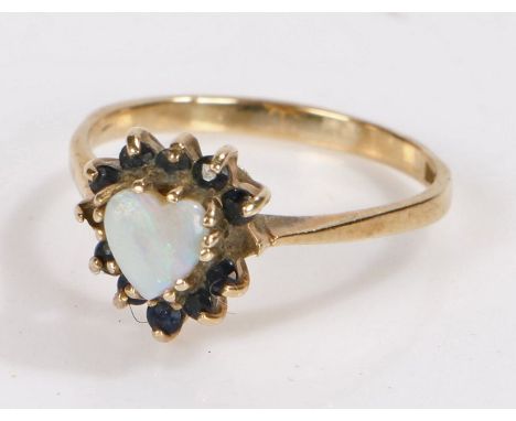 9 Carat Gold ring with an opal stone, ring size M