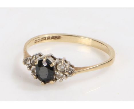 9 Carat gold and sapphire ring, ring size, gross weight 1.1 grams