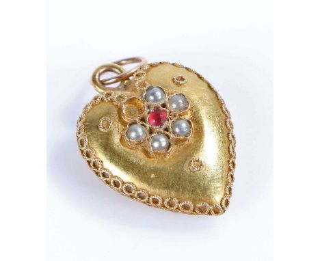 Indian Yellow metal heart shaped pendant with a ruby and pearl design to both sides&nbsp;