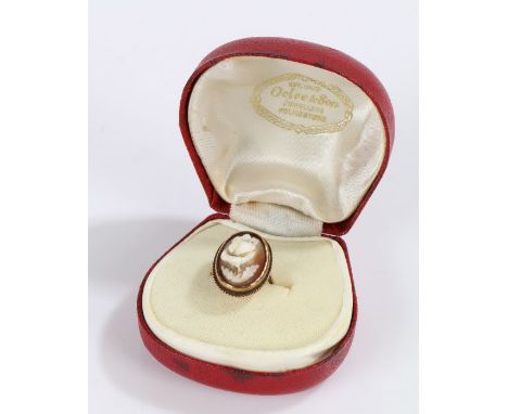 9 Carat Gold ring set with a cameo depicting a flower housed in a box, gross weight 4.2g