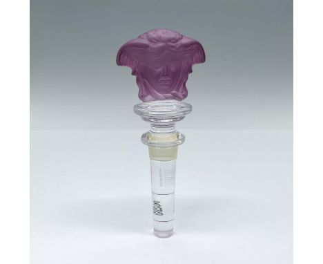 A Rosenthal Meets Versace crystal bottle stopper with dual purple figural Medusa head in frosted crystal. Marked Rosenthal Ve