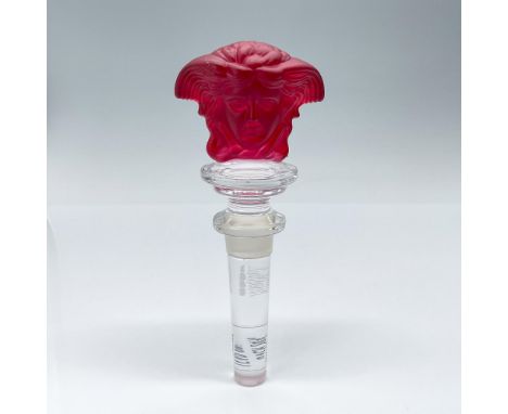 A Rosenthal Meets Versace crystal bottle stopper with dual red figural Medusa head in frosted crystal. Marked Rosenthal Versa