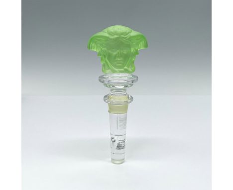 A Rosenthal Meets Versace crystal bottle stopper with dual figural Medusa head in green frosted crystal. Marked Rosenthal Ver