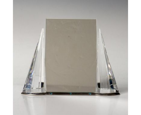 A vintage standing picture frame with a mirror by Swarovski. The stand is adorned with two faceted clear crystal cones, while