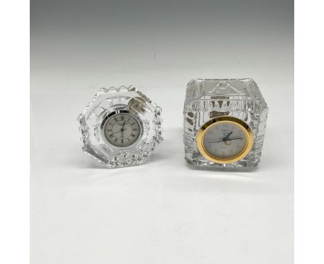 Clear crafted crystal octagon with white face and black roman numerals and crystal adorned with ABC's with matching face cloc