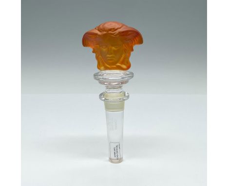 Rosenthal Meets Versace bottle stopper with dual figural Medusa head in orange frosted crystal. Marked Rosenthal Versace. Thi