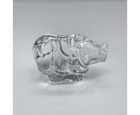 Clear glass figurine featuring a compact Rhinoceros. Inspired by historical hand-cooling practices where young ladies used gl