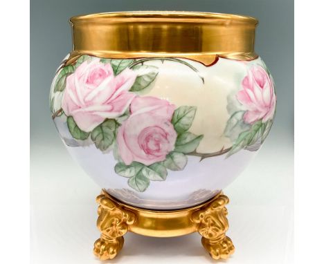 Beautiful hand painted rose design, colored in pink, green and blue with gilt rim. Pedestal has porcelain center with gilt-co