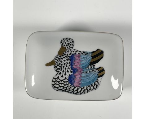 First edition hand painted porcelain box with pair of ducks in black fishnet pattern, gilded rim and painted scalloped trim. 