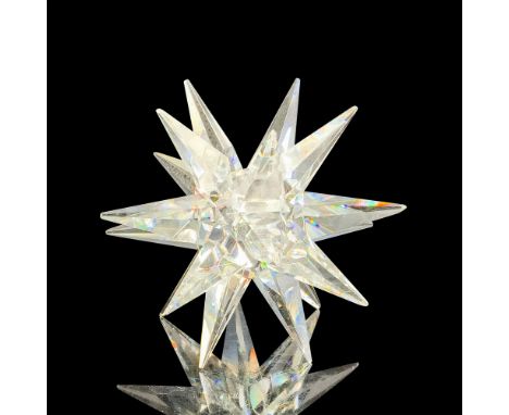 This retired piece is made from clear crystal. Swarovski acid stamp. Item includes original box measuring 8"L x 8"W x 6"H. Di