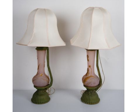 Two vintage lamps with green metal frame/base, pink opaque glass with gold floral and leaf design in low-relief. Cream lampsh
