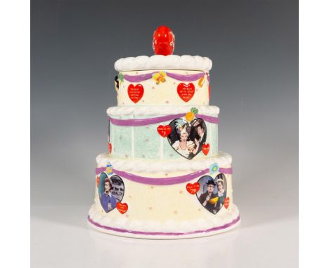 A porcelain covered jar formed as a three-tiered cake celebrating the anniversary of the American sitcom, I Love Lucy. Limite