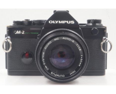 Olympus OM2 spot program camera and lens. UK P&amp;P Group 1 (£16+VAT for the first lot and £2+VAT for subsequent lots) 