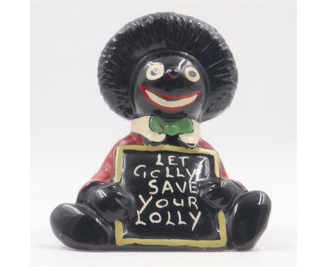 Ceramic golly moneybox, H: 18 cm. UK P&P Group 1 (£16+VAT for the first lot and £2+VAT for subsequent lots) Notice from the t