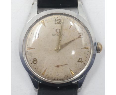 OMEGA: 1960s gents steel cased manual wind wristwatch, champagne coloured dial with baton and Arabic chapters, working at lot