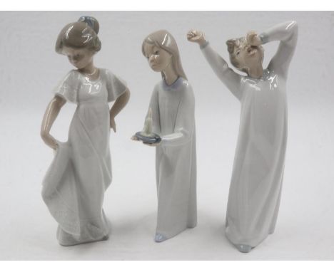 Two Lladro and one Nao figurines. UK P&amp;P Group 2 (£20+VAT for the first lot and £4+VAT for subsequent lots) 