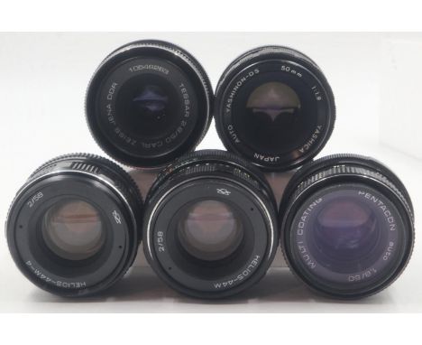 Five prime lenses including Zeiss and Yashica. UK P&amp;P Group 2 (£20+VAT for the first lot and £4+VAT for subsequent lots) 