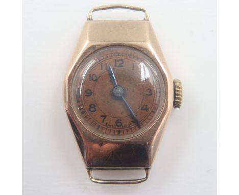 UNO: ladies 9ct gold manual wind wristwatch head, Roman chapters against a two-tone burnt orange and brown dial, overall 6.3g