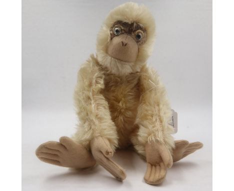 Possibly vintage Farnell Alpha toys wood wool filled monkey, fully jointed with glass eyes. H: 47cm. UK P&amp;P Group 1 (£16+