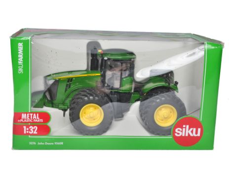 Siku 1/32 Farm Model issue comprising No. 3276 John Deere 9560R Tractor. Excellent in box. Box is good, some storage wear. 