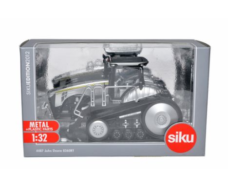 Siku 1/32 Farm Model issue comprising no. 4487 John Deere 8360RT Tractor. Silver special edition. Excellent and secured in bo