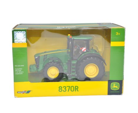 Britains 1/32 Farm Model issue comprising no. 42999 John Deere 8370R Tractor. Excellent and secured in box. Box is excellent.