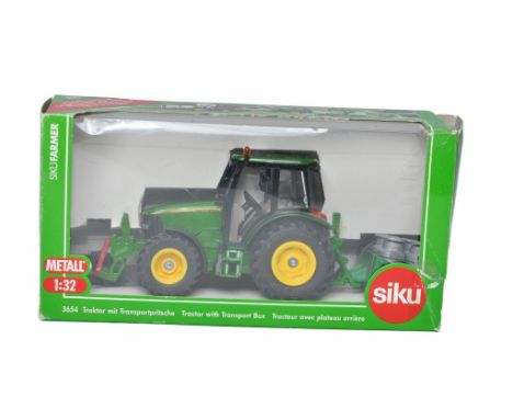 Siku 1/32 Farm Model issue comprising No. 36542 John Deere 5620 Tractor with transport box. Excellent in box. Box is fair. 