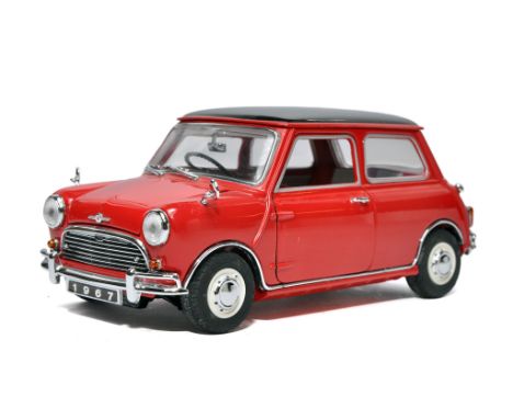 Franklin Mint 1/24 diecast model car comprising Morris Mini Cooper S. Excellent (complete with paperwork) with original box. 