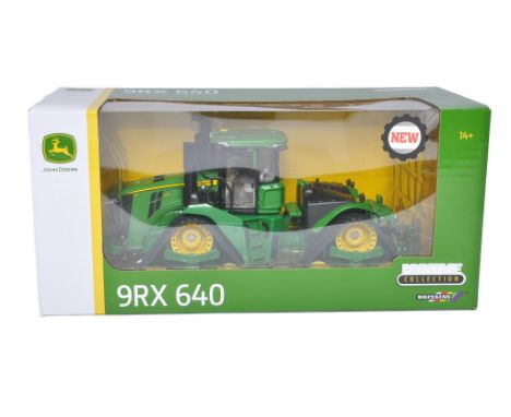 Britains 1/32 Farm Model issue comprising No. 43300 John Deere 9RX 640 Tractor. Excellent in box. Box is excellent. 