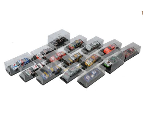 A group of fifteen Nascar themed diecast model vehicles in cases as shown. Racing Champions? Have been displayed but still ge