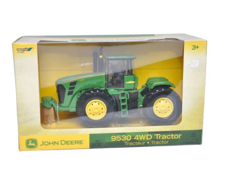 Ertl 1/32 Farm Model issue comprising no. 15141 John Deere 9530 4WD Tractor. 3+ Edition. Excellent and secured in box. Box is