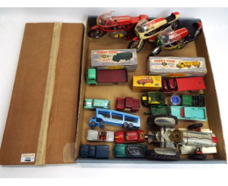 Mixed selection of diecast vehicles, Dinky flatbed trucks, Dinky Renault and army trucks, multi purpose display case to be as