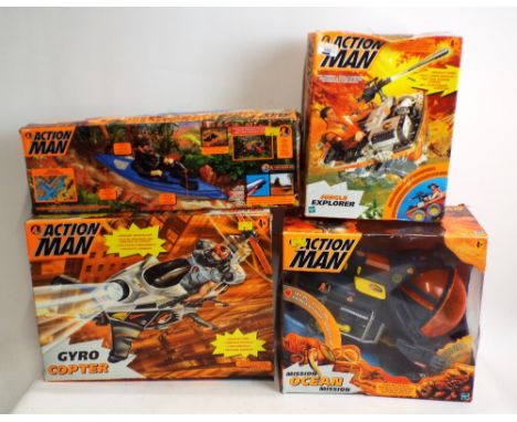 Four boxed Action man vehicles including a canoe, Giro Copter, Mission Ocean, Jungle Explorer   