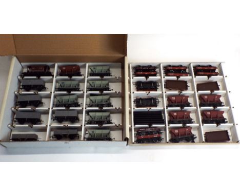 A collection of 00 gauge hopper wagons, coal wagons, brake van etc 