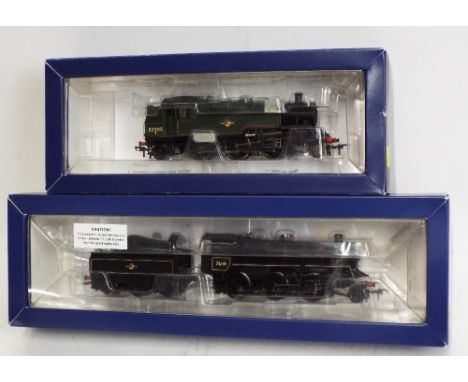 Two Bachmann 00 gauge steam locomotives, a boxed BR standard class 3MT tank, and class 4MT 2-6-0