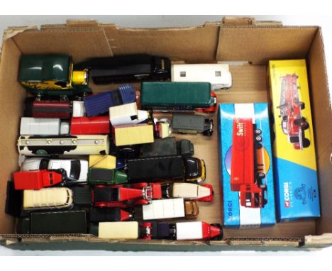 Boxed Corgi Volvo container Swift services 98100 and boxed Corgi classic Chicago ladder truck 52701 together with a selection