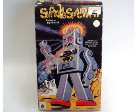 Boxed smoking spaceman battery operated robot by Ha Ha toys